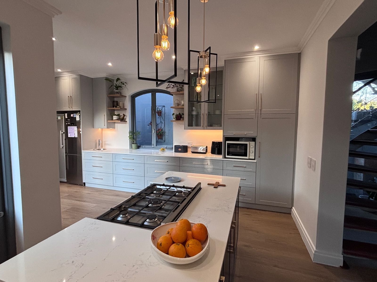 Renovated Cape Town kitchen with a new ceiling, cornices, bulkhead and recessed lighting